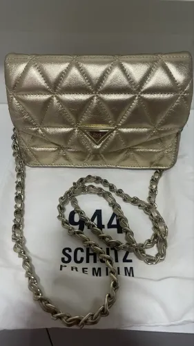 Bolsa Schütz 944 dourada
