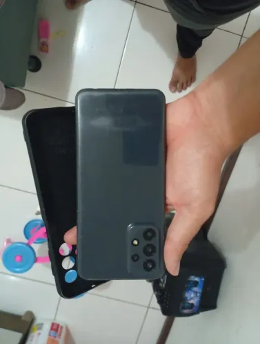 Celular com defeito