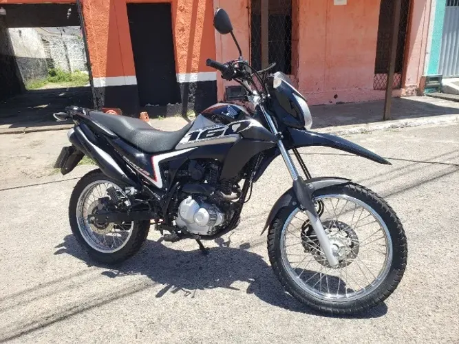 Bross em estado de zero, com capacete novo! 18.500