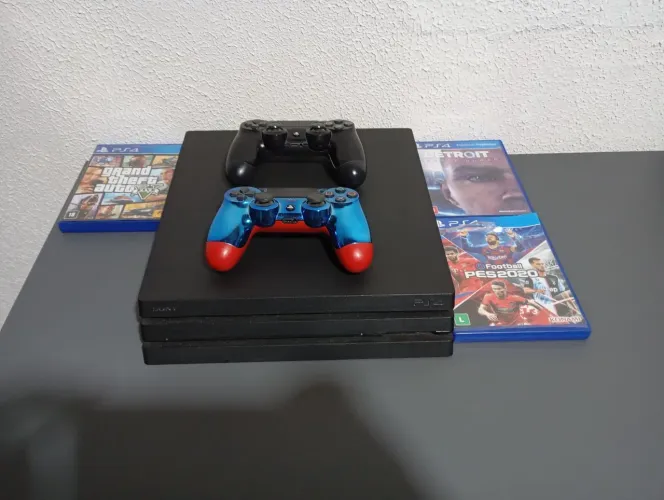Ps4 pro com1tb,cabos, 2 controles e 3 jogos