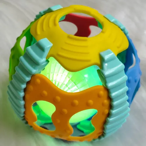Brinquedo Bola Mordedor Com Som e Luz Buba