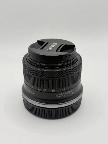 Lente Canon Rf-s 18-45mm F4.5-6.3 Is Stm Black Cor Preto