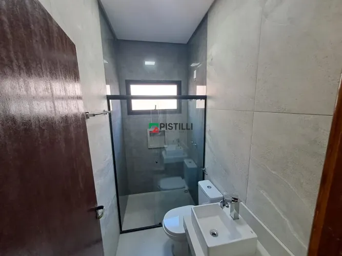 Casa com 3 dormitórios à venda, 129 m² por R$ 850.000,00 - Condomínio Malibu - Caçapava/SP