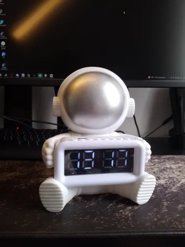 RÁDIO DESPERTADOR COM CAIXA DE SOM ASTRONAUTA