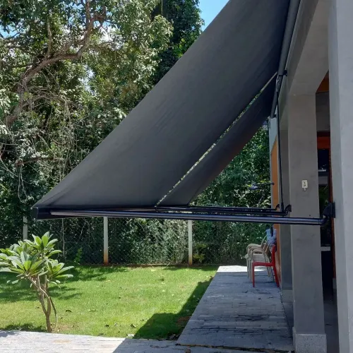 Toldo pivotante