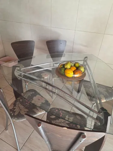 Mesa vidro , inox com 8 cadeiras 
