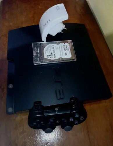 PlayStation 3 Slim Desbloqueado + HD 500GB + Repetidor Wi-Fi