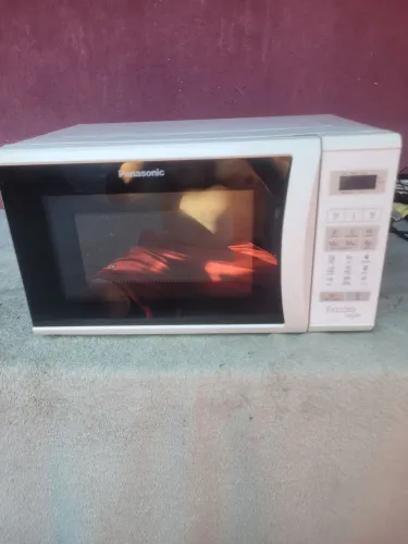 Vendo micro-ondas Panasonic 23 litros espelhado funcionando perfeitamente 