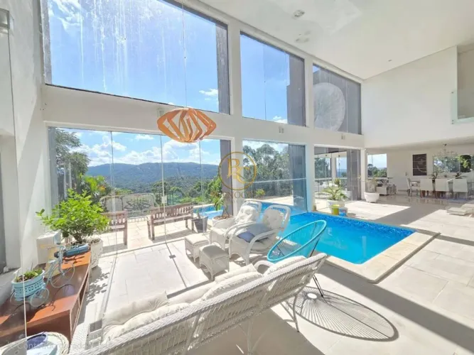 Casa com 4 quartos, 600 m² - venda por R$ 4.195.000 ou aluguel por R$ 19.650 - Serra da Ca