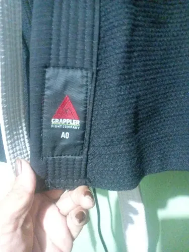 Kimono de jiu-jitsu juvenil A0 novo preto, 250,00. Moro em outeiro