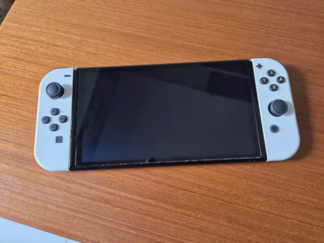 Vendo Nintendo Switc Oled 64gb