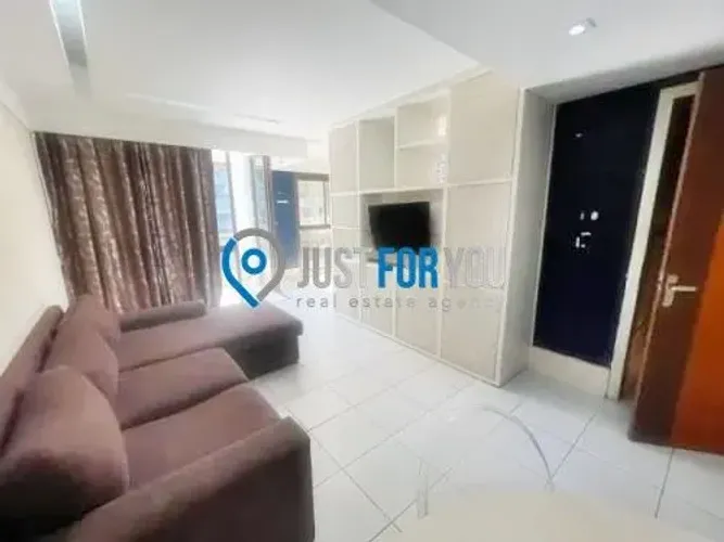 Apartamento com 1 dormitório para alugar, 76 m² por R$ 9.500,00/mês - Barra da Tijuca - Ri