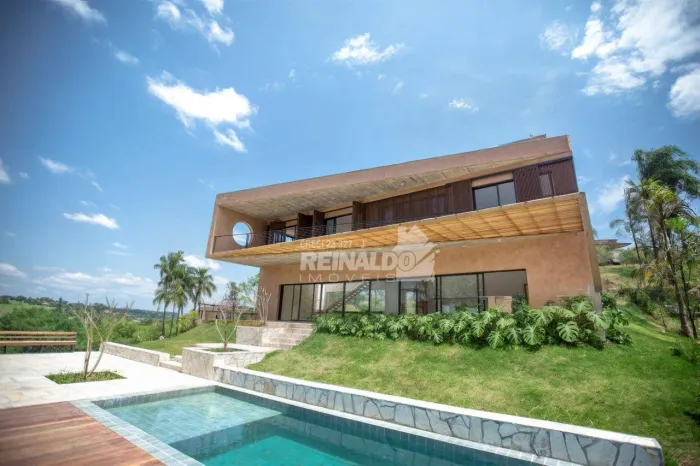 Casa com 4 dormitórios à venda, 640 m² por R$ 7.680.000 - Condomínio Fazenda Dona Carolina
