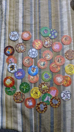 38 Tazos poke mon (como novos)