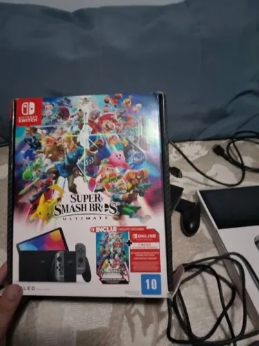 Nintendo Switch OLED Edição Super Smash Bros + Zelda BotW + Pokémon (Seminovo)