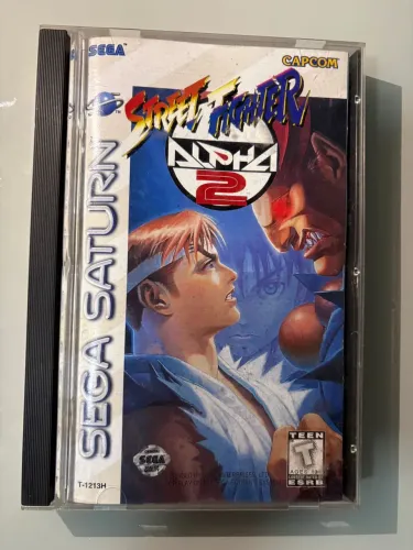 Street Fighter Alpha 2 para Sega Saturn, versão original e completa. 