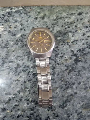 Vendo relógio oriente 3 estrelas automático funcionando, está sem botão de regulagem. Leia