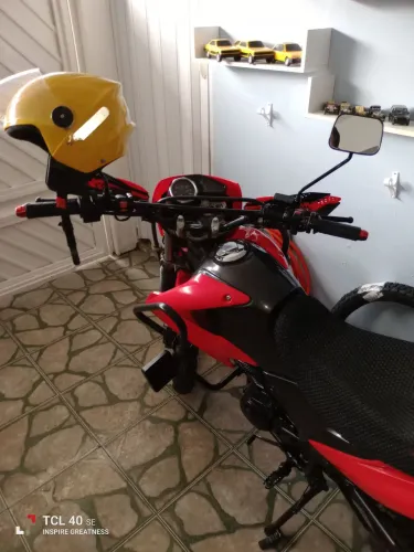 Moto semi nova manutenção em dia