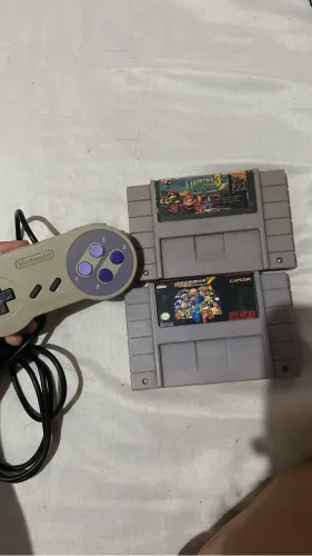 2 jogos paralelo e um controle original super Nintendo 