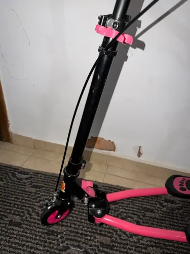 Patinete de três rodas