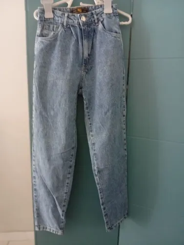 Calça Jeans Azul Jeanswear e um shorts duas peças