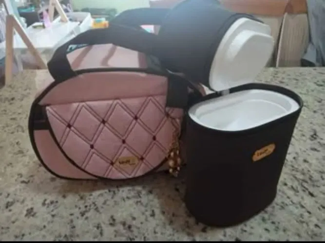 Bolsa maternidade rosa com  porta mamadeira térmico 