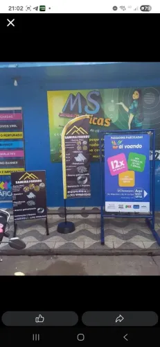 Fachada comercial em lona impressa