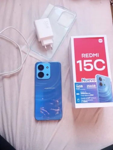 Redimi 15C 256Gb troco em iPhone 11 ou XR com volta da pessoa