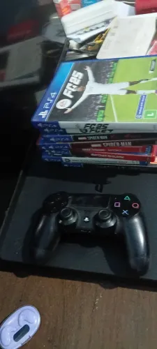 Ps4 Slim Semi Novo com 1 controle +8 jogos fisicos incluindo os 2 homem aranha de ps4