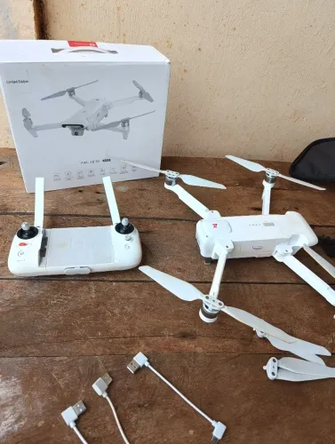 Vendo ou troco drone FIMI X8 SE 2022 troco por algo do meu interesse de preferência ar 24