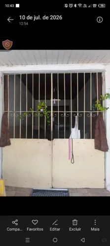 Portão de ferro, medindo 21,0 largura , 2,35 de altura