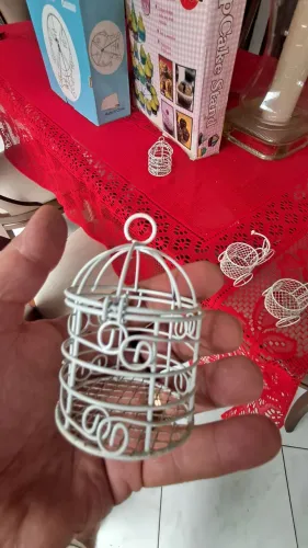 Gaiola e bicicleta de metal para decoração de doces em festa