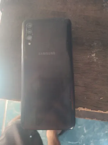 Celular com defeito
