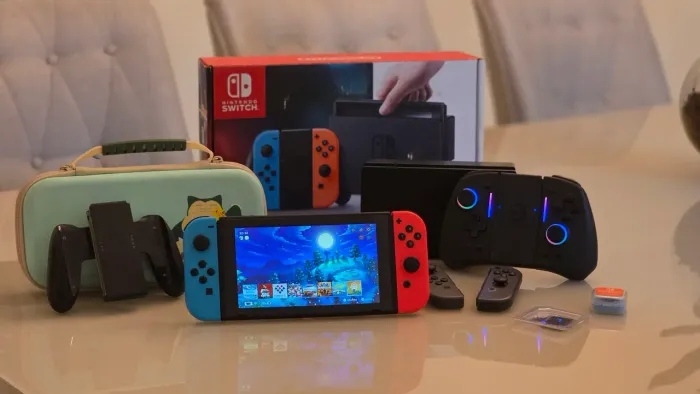 Nintendo Switch V2 Desbloqueado com acessórios na caixa.