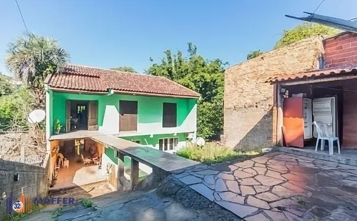 Casa de 5 dormitórios à venda no Bairro Bom Jesus - Porto Alegre