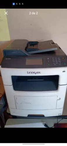 Impressora preta e branca Lexmark 410