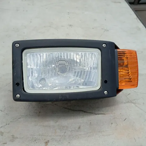 Farol para Motoniveladora New Holland Esquerdo Original