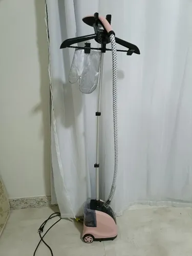 Passadeira de roupas a vapor