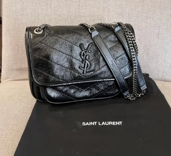 Bolsa Niki em couro tiracolo saint laurent