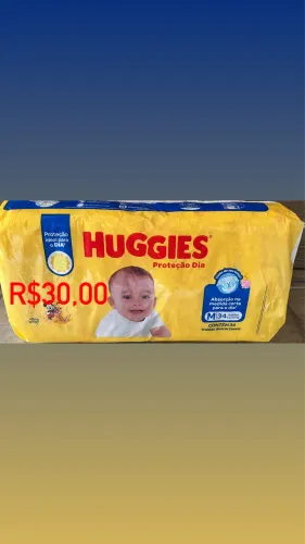 Fraldas Huggies tripla ação tamanho M.