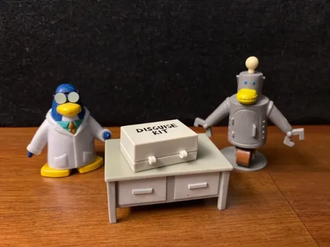 Club Penguin Mix n Match - Gary e o Robô com mesinha e maleta - Jakks Pacific