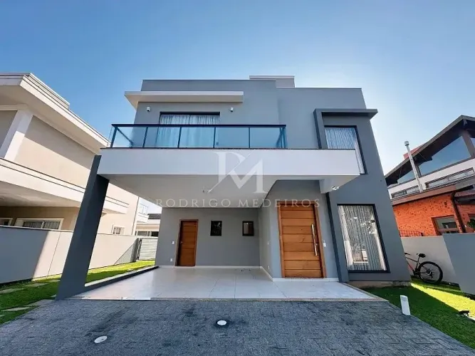 Casa à venda em condomínio no Campeche, Florianópolis, com 4 dormitórios