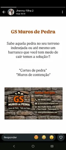 Trabalho com corte de pedra e muro calçada