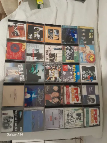 100 cds e dvds de rock e pop