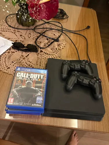 ps4 slim +8 jogos