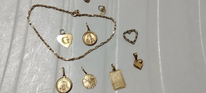 Pingente de ouro e pulseira de ouro preços variados vendo ou troco
