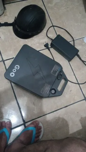 1500,00 Bateria da scooter,carregador e capacete