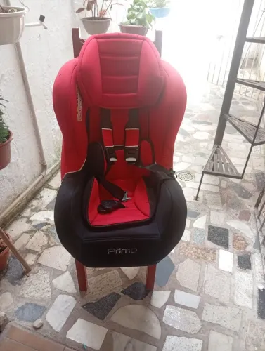 Estou vendendo uma cadeira de criança de transporte de carro