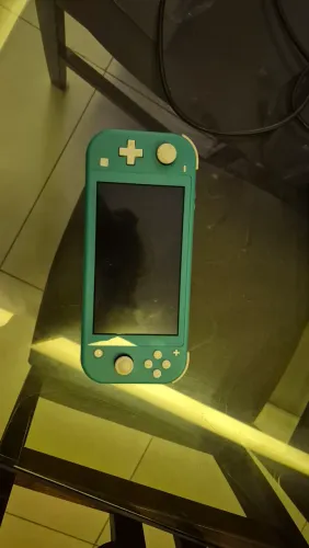 Nintendo switch lite + case +carregador original
