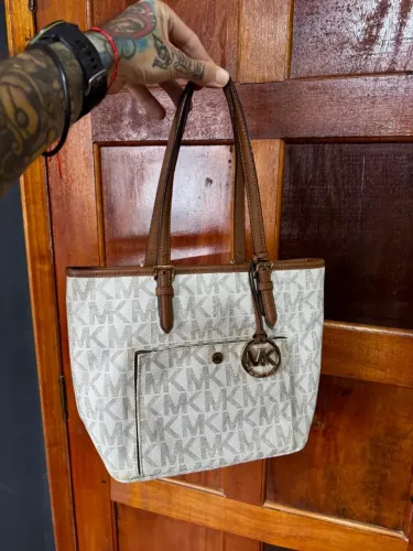 Bolsa Michael Kors Jet Set Front Snap Medium